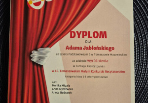 Dyplom wyróżnienia dla Adama
